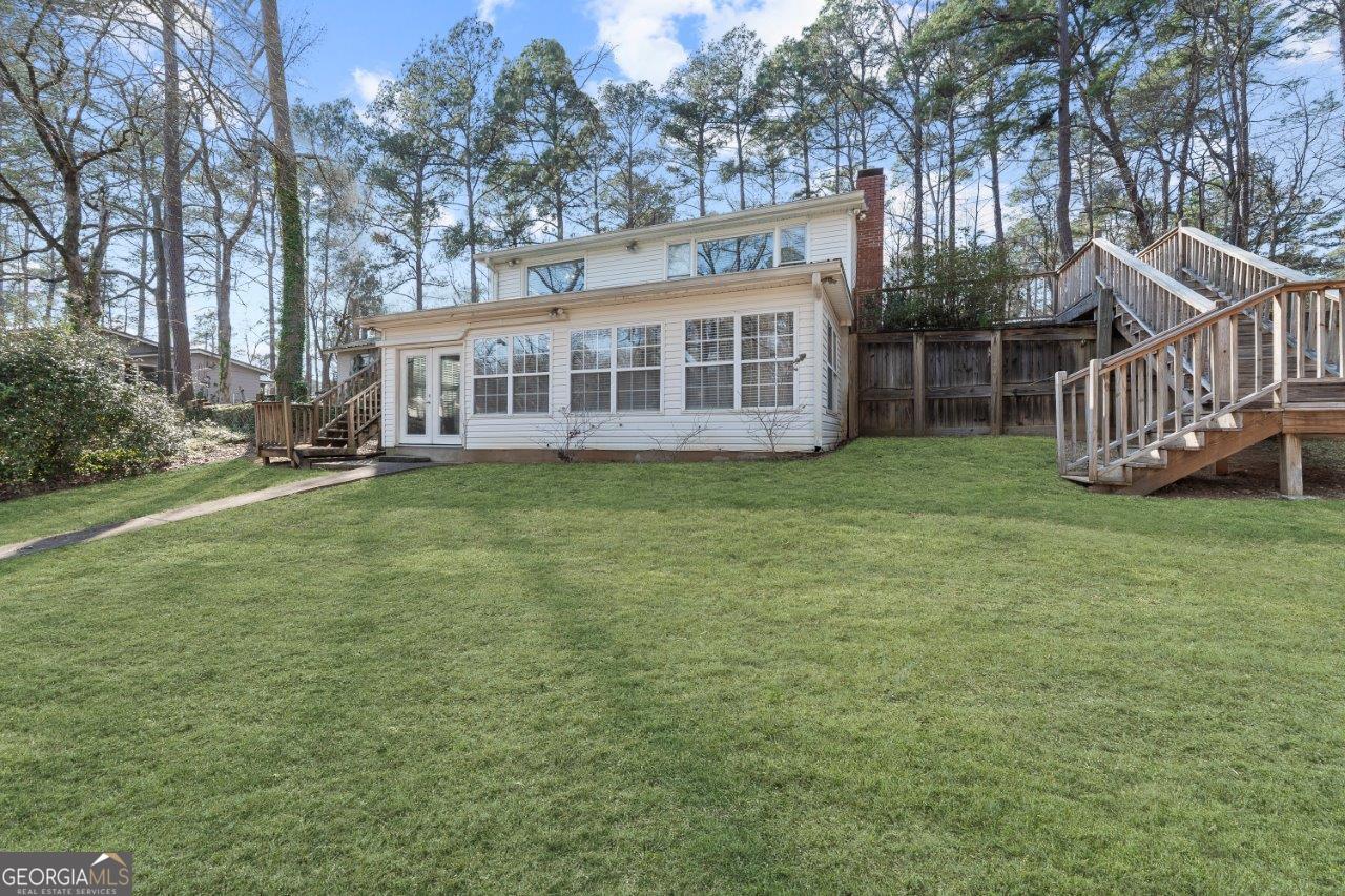 109 Horseshoe Bend Road Southwest Eatonton, GA 31024 - Photo 42 of 42 a view of a house with a yard and sitting area