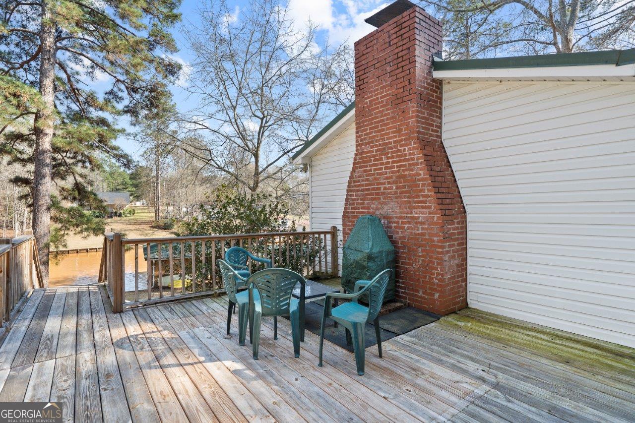 109 Horseshoe Bend Road Southwest Eatonton, GA 31024 - Photo 7 of 42 a view of deck with patio