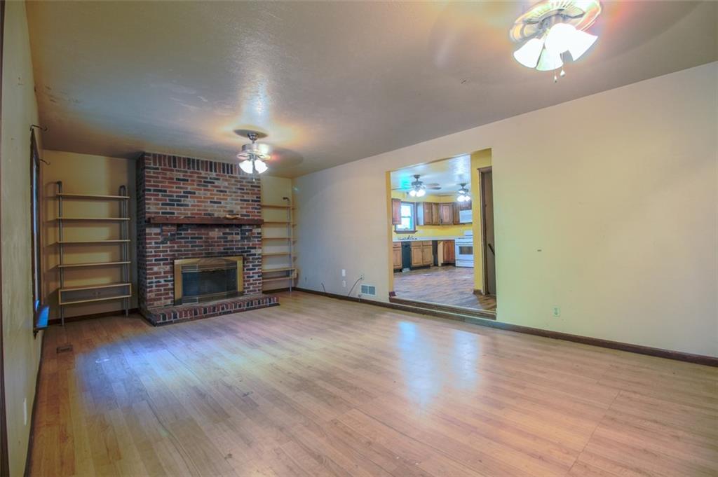 206 Pittview Road Pittsburgh, PA 15237 - Photo 13 of 46 Great flow exists from the kitchen to the massive 30x14 1st floor family room with a gas fireplace.