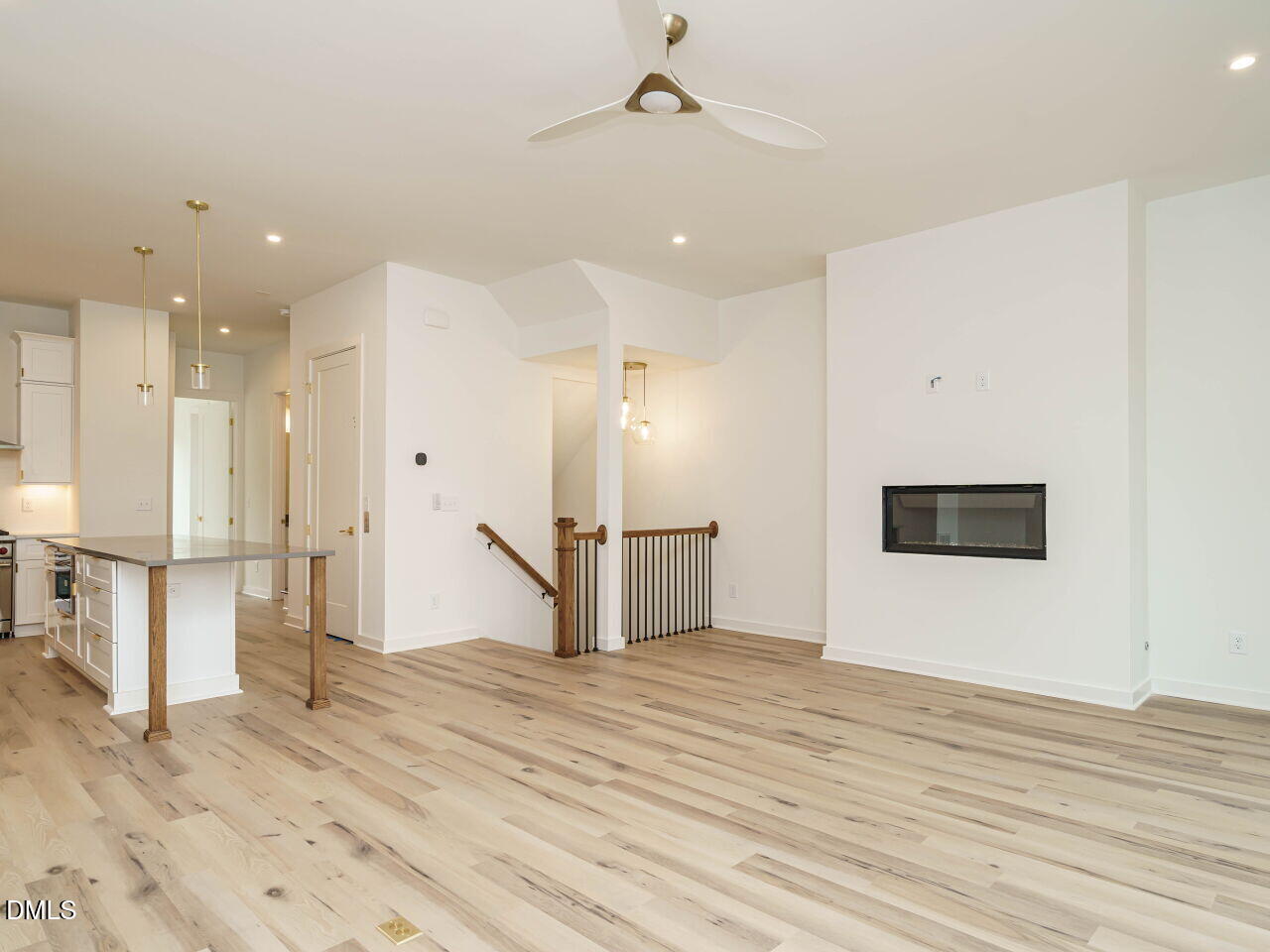 1533 Urban Trace Lane Raleigh, NC 27608 - Photo 13 of 28 a view of empty room with wooden floor