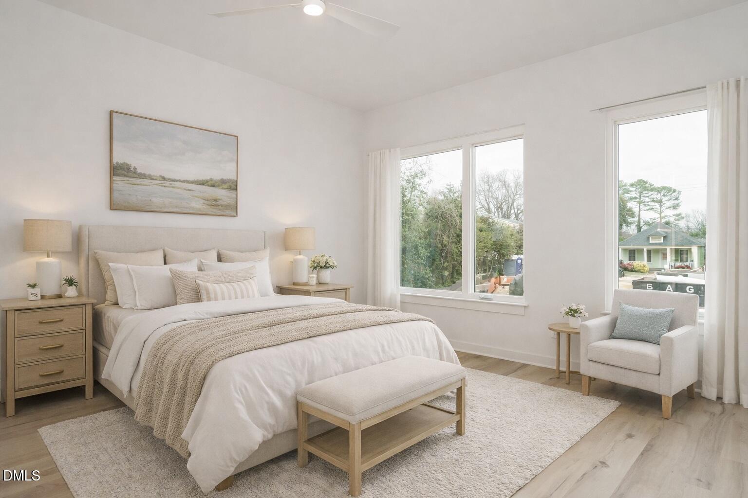 1533 Urban Trace Lane Raleigh, NC 27608 - Photo 18 of 28 a bedroom with a bed and a couch