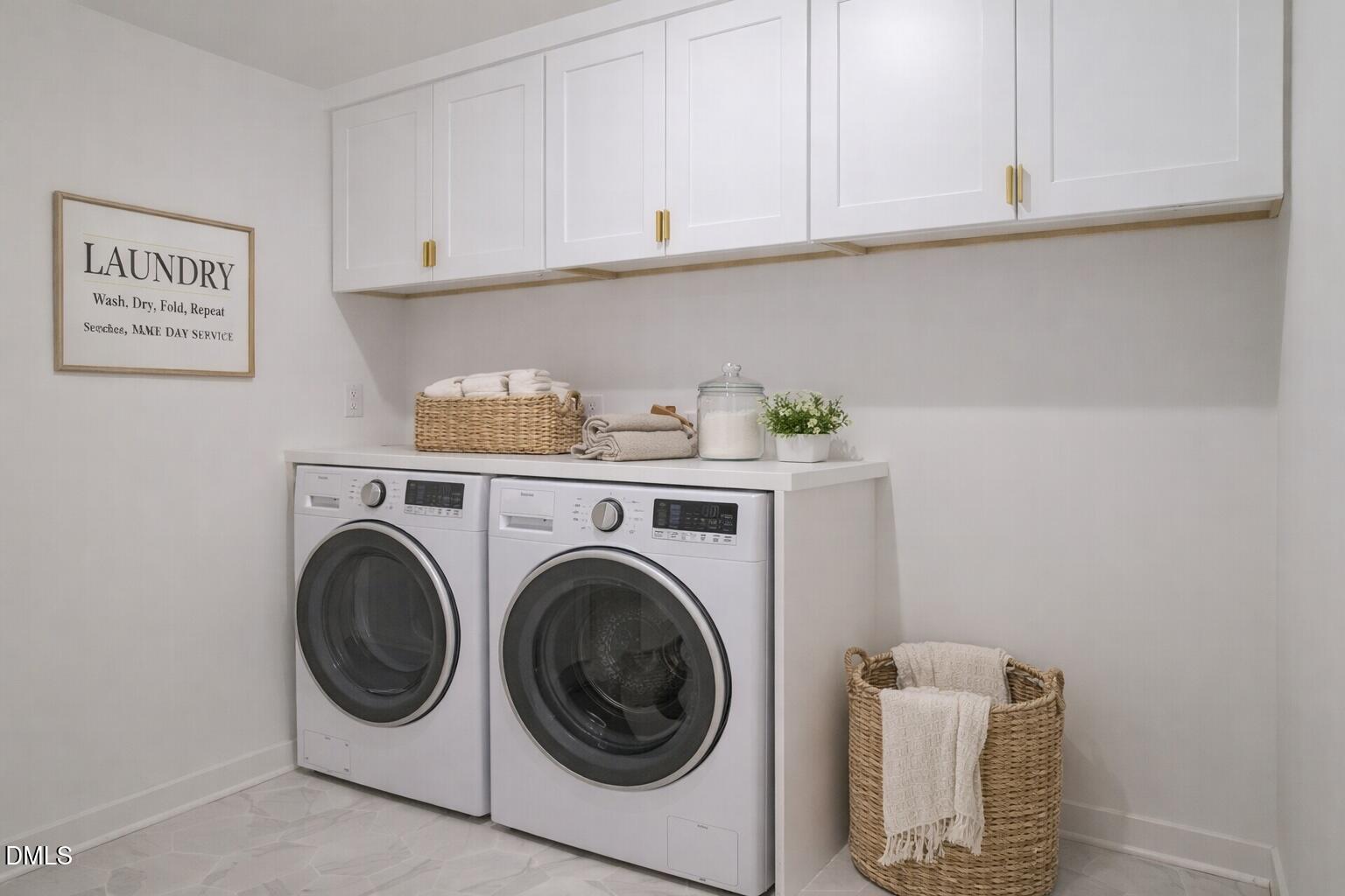 1533 Urban Trace Lane Raleigh, NC 27608 - Photo 9 of 28 a utility room with dryer and washer