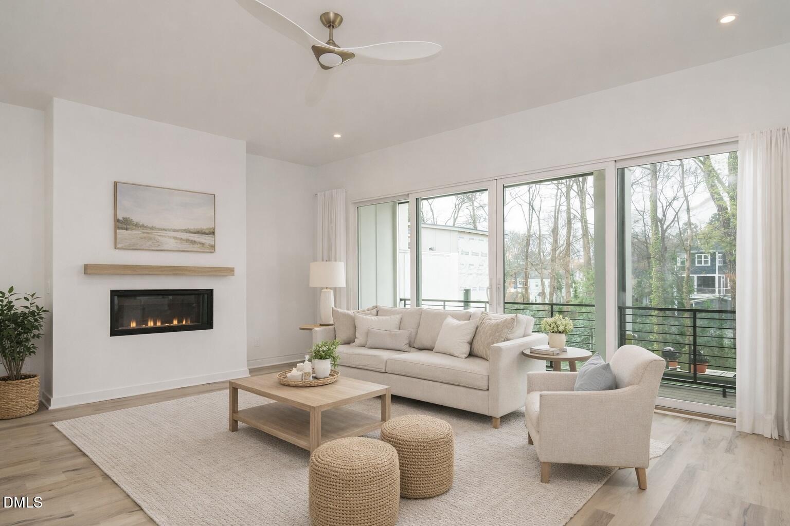 1533 Urban Trace Lane Raleigh, NC 27608 - Photo 10 of 28 a living room with furniture and a fireplace