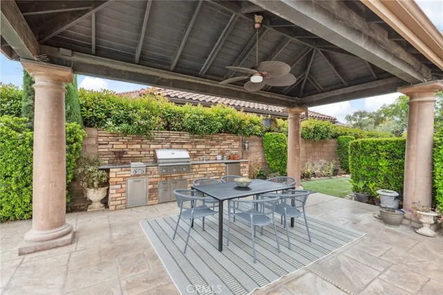 a view of a house with a yard porch and sitting area