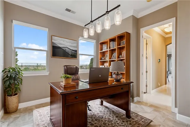 a stove top oven sitting inside of a kitchen