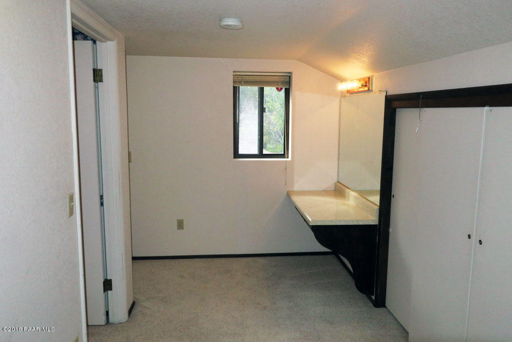 1807 Thumb Butte Road Prescott, AZ 86305 - Photo 23 of 41 Upstairs Closet & Dressing Area