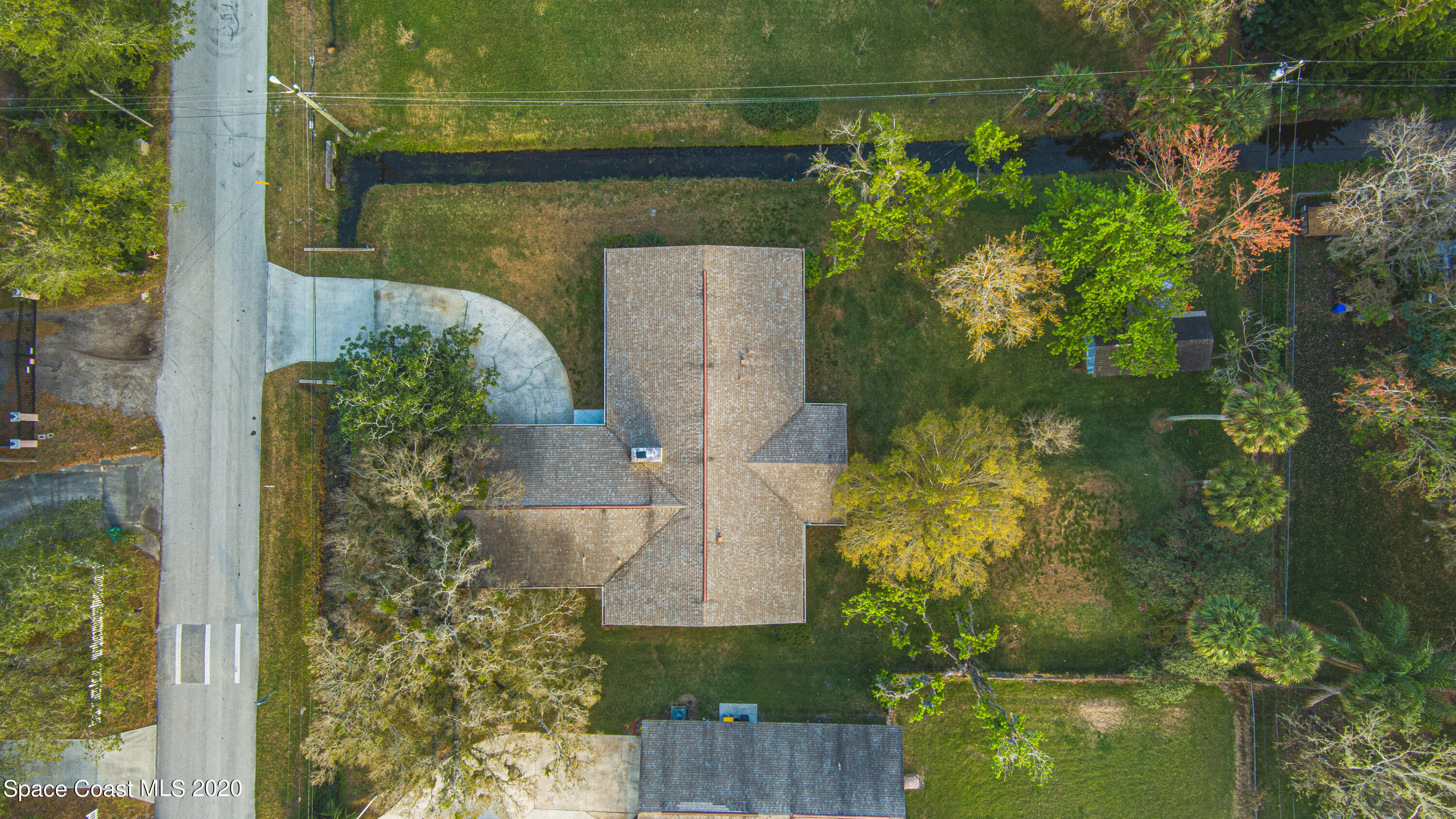 1945 Trimble Road Melbourne, FL 32934 - Photo 13 of 83 aerial view of a house