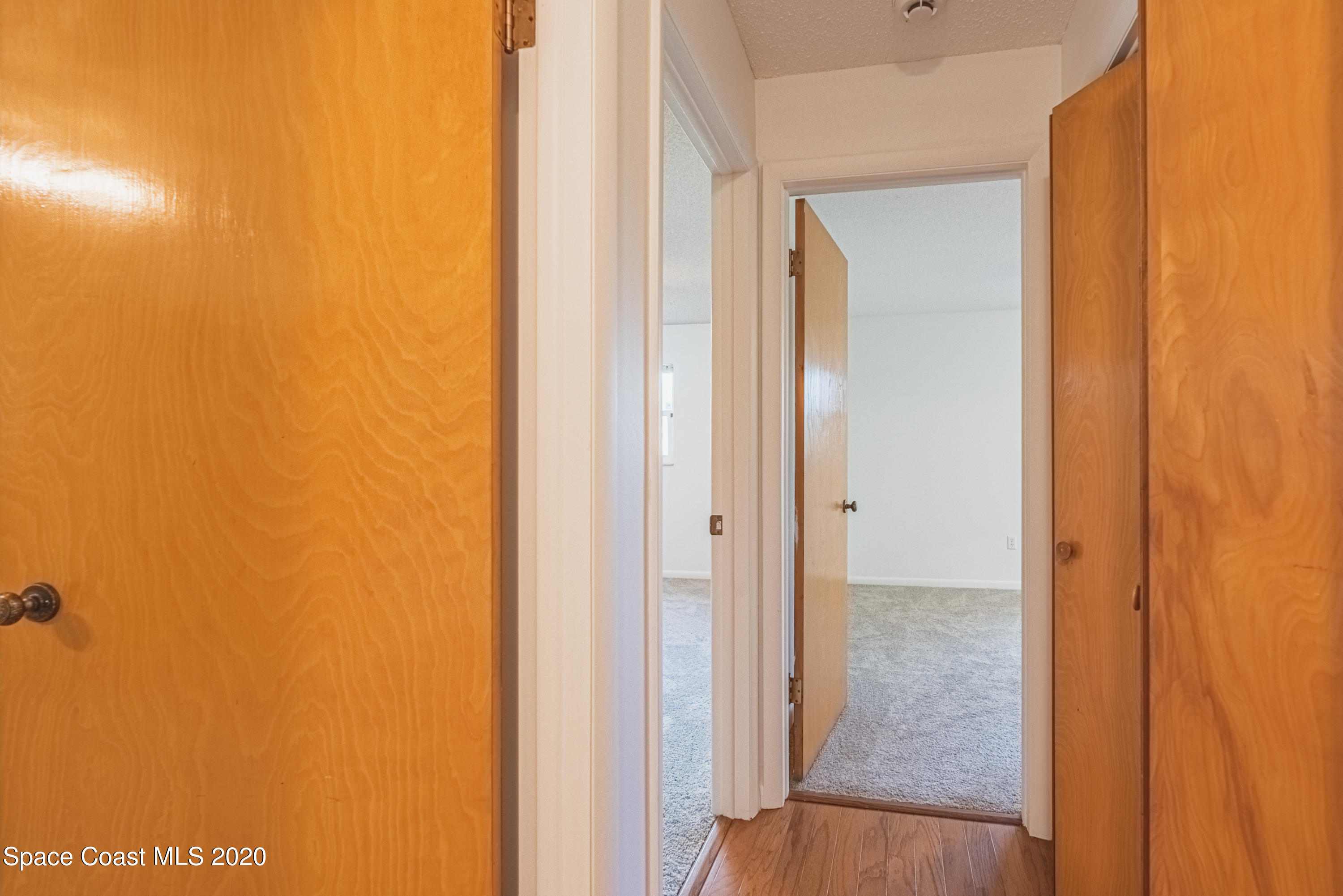 1945 Trimble Road Melbourne, FL 32934 - Photo 33 of 83 a view of a bathroom from a hallway