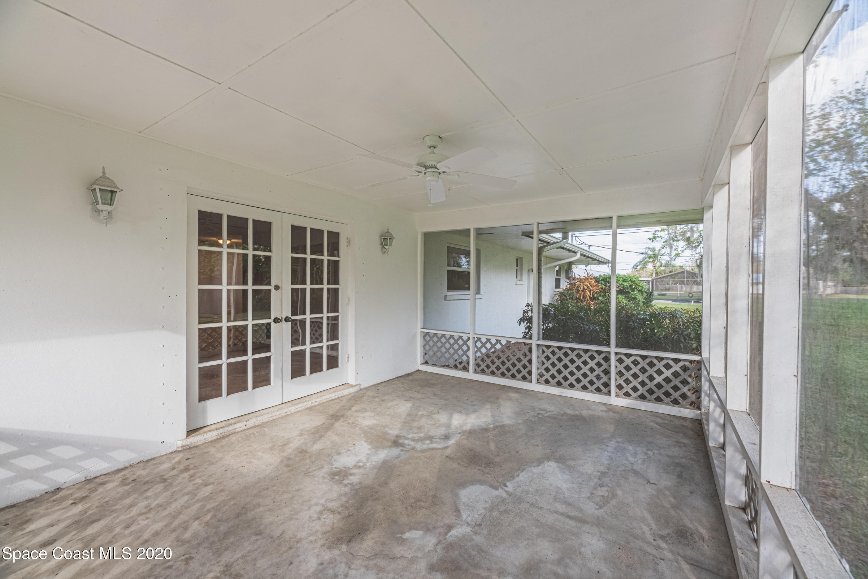 1945 Trimble Road Melbourne, FL 32934 - Photo 48 of 83 a view of empty room with windows