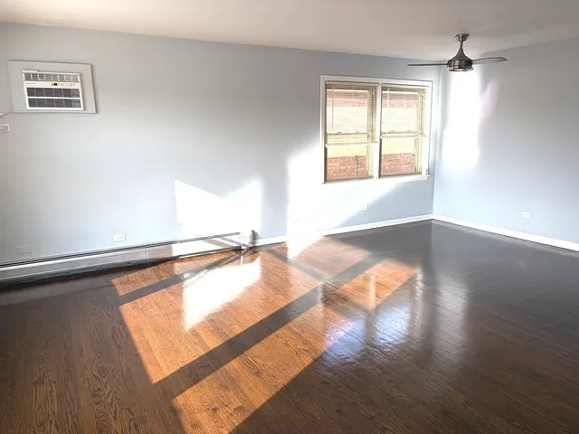 a view of an empty room and window