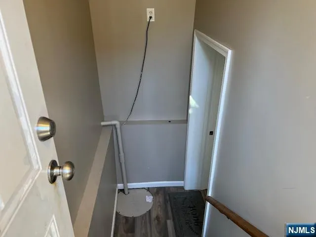 a view of storage and utility room with a washer dryer