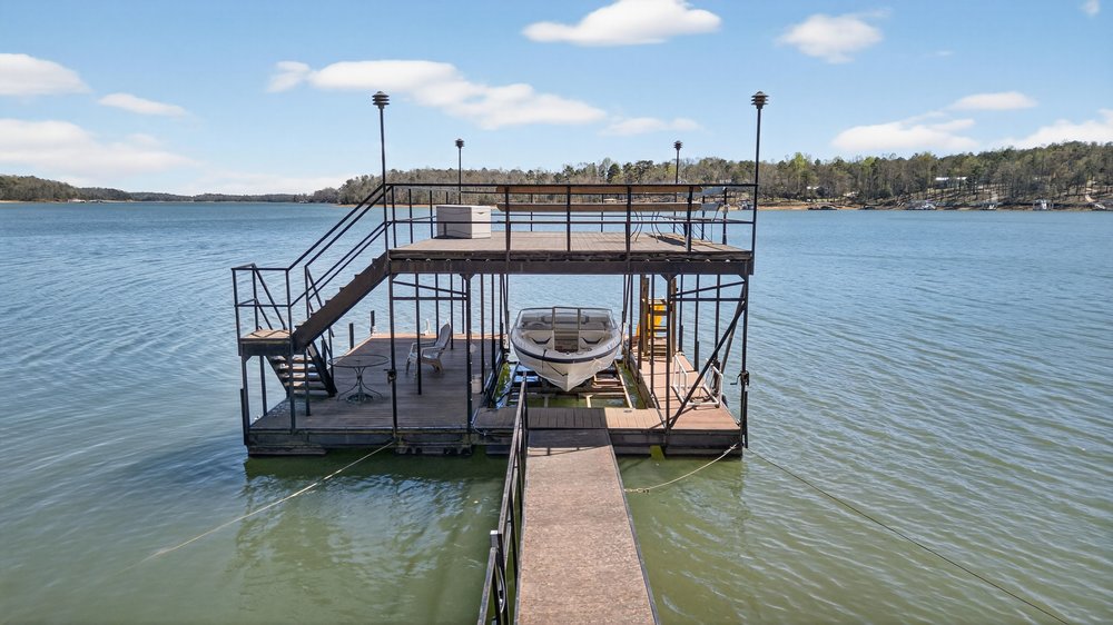 738 Seminole Point Road Fair Play, SC 29643 - Photo 4 of 46 Dock #1 is a single slip dock with a boat lift and an upper deck