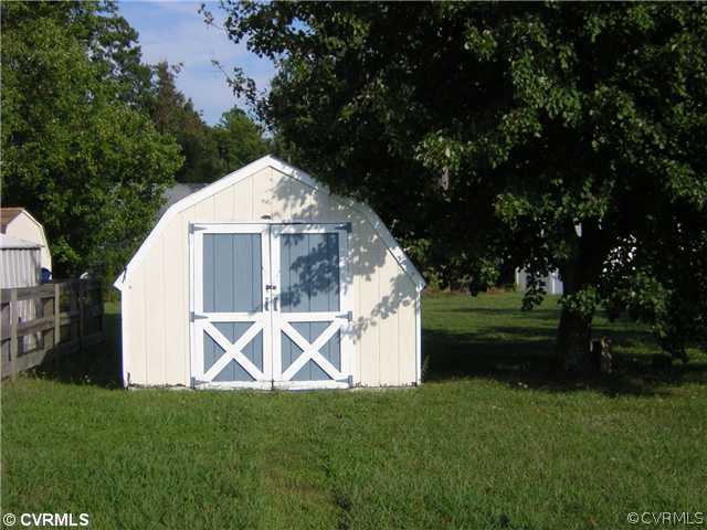 4807 Parrish Branch Road Midlothian, VA 23112 - Photo 4 of 4 Storage - Big storage shed for mower and supplies.
