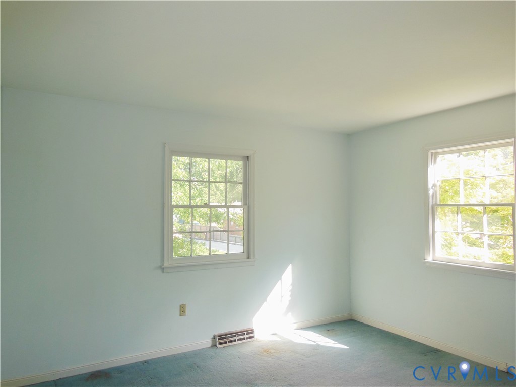 8218 Overbury Road Richmond, VA 23227 - Photo 30 of 37 a view of an empty room with a window