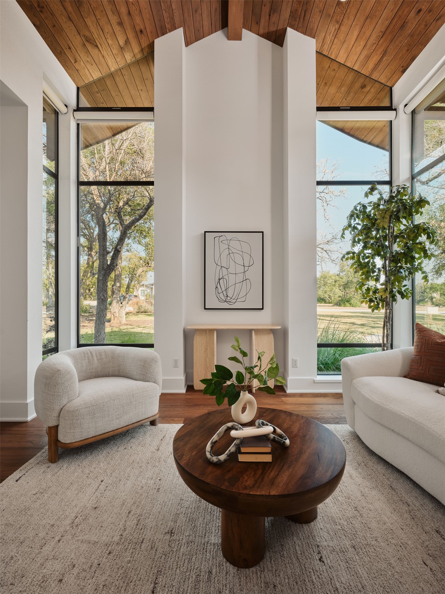 183 Tiffanie Way Austin, TX 78737 - Photo 27 of 37 Sitting room with wood finished floors, plenty of natural light, and wooden ceiling