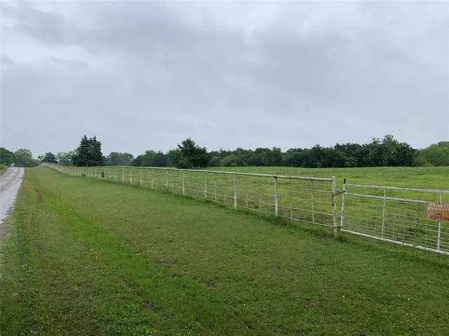 a view of a golf course with a lake