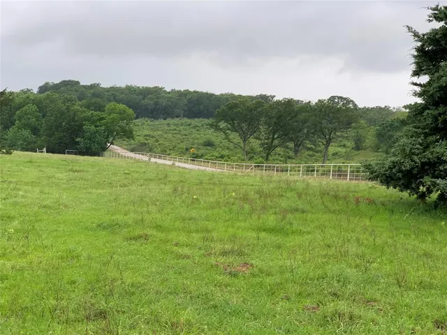 a view of an outdoor space and a yard