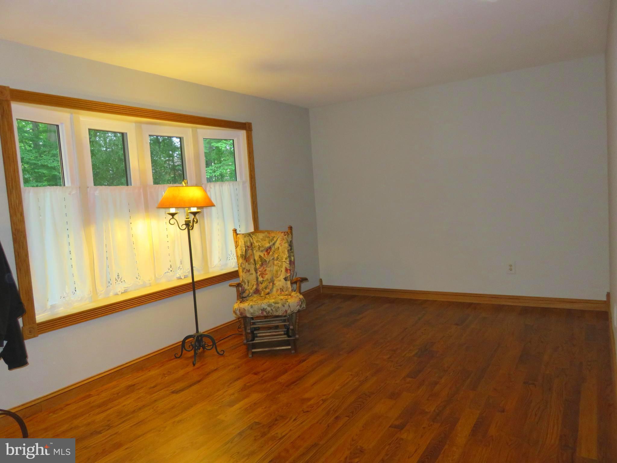 1051 Hook Road Westminster, MD 21157 - Photo 11 of 30 Living Room Gleeming Hdwds & Bow Window