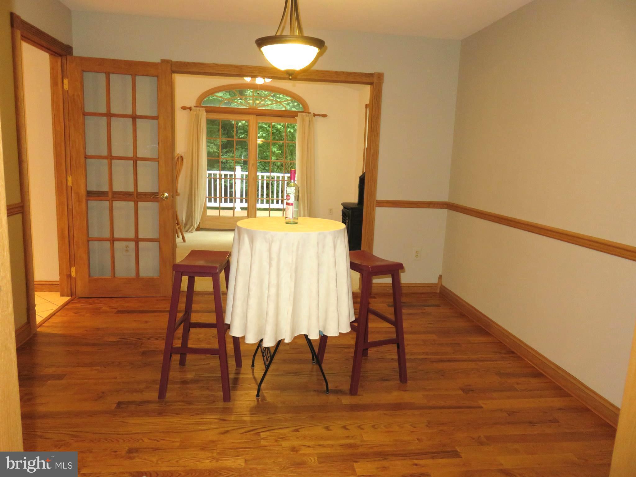 1051 Hook Road Westminster, MD 21157 - Photo 12 of 30 Dining Room Features Hardwood & Chair Rail