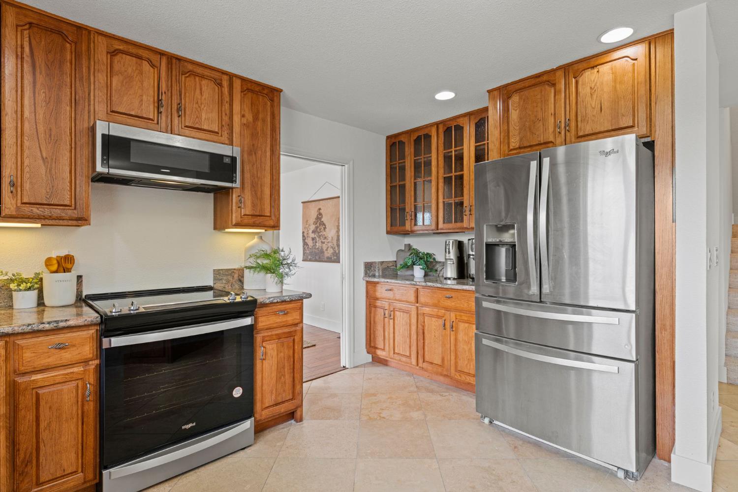 22160 Winchester Way Colfax, CA 95713 - Photo 14 of 84 a kitchen with stainless steel appliances granite countertop a refrigerator stove and sink