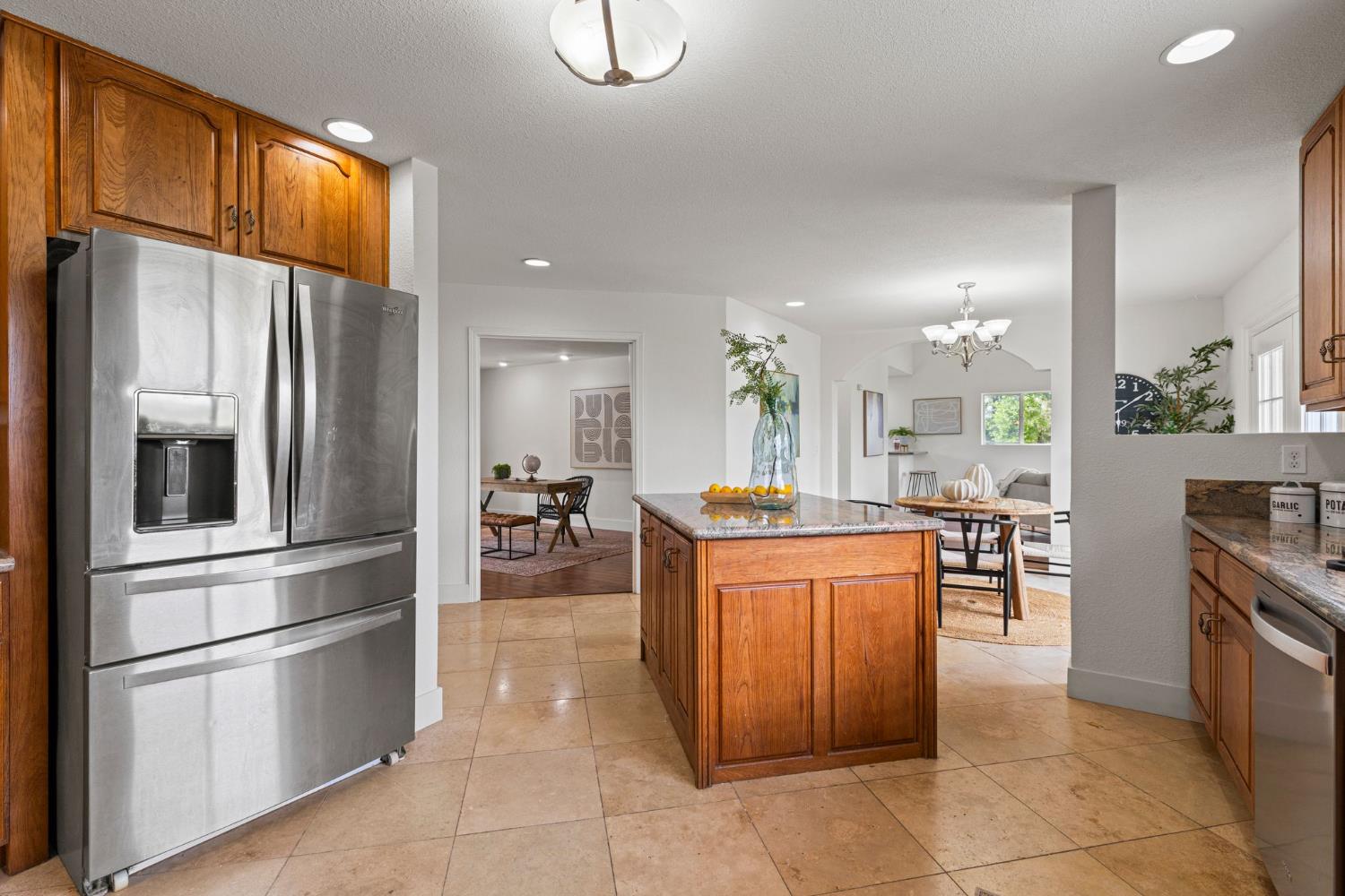22160 Winchester Way Colfax, CA 95713 - Photo 15 of 84 a kitchen with stainless steel appliances granite countertop a refrigerator a stove and a sink