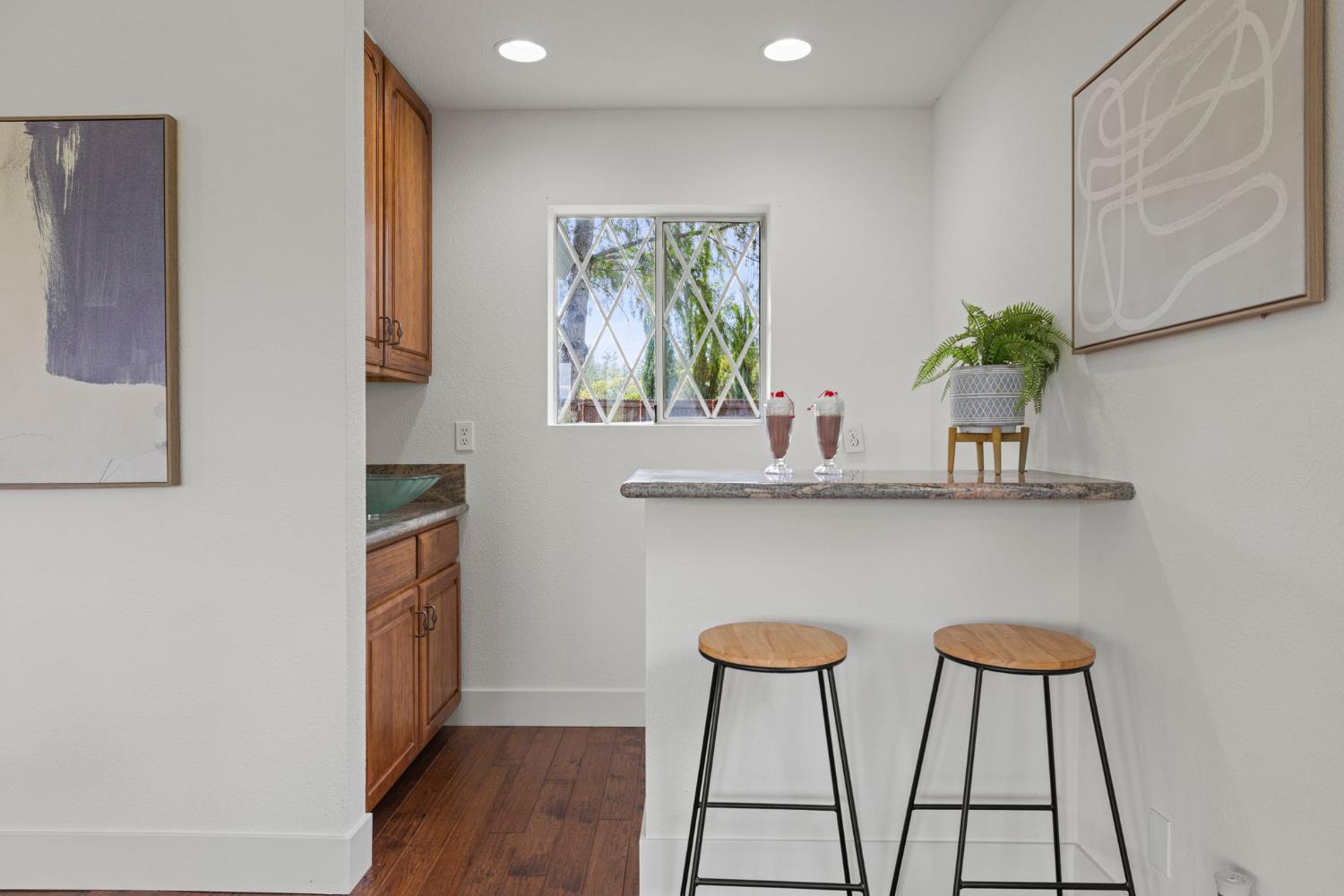 22160 Winchester Way Colfax, CA 95713 - Photo 23 of 84 a kitchen with stainless steel appliances a refrigerator and a table
