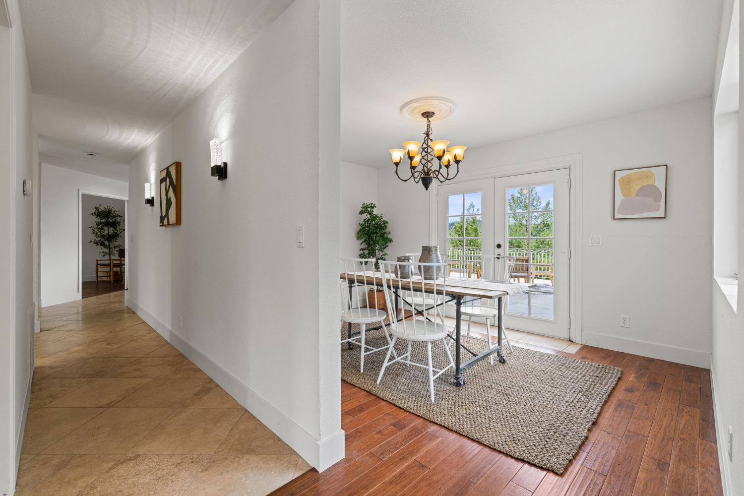 22160 Winchester Way Colfax, CA 95713 - Photo 28 of 84 a view of a dining room with furniture and chandelier
