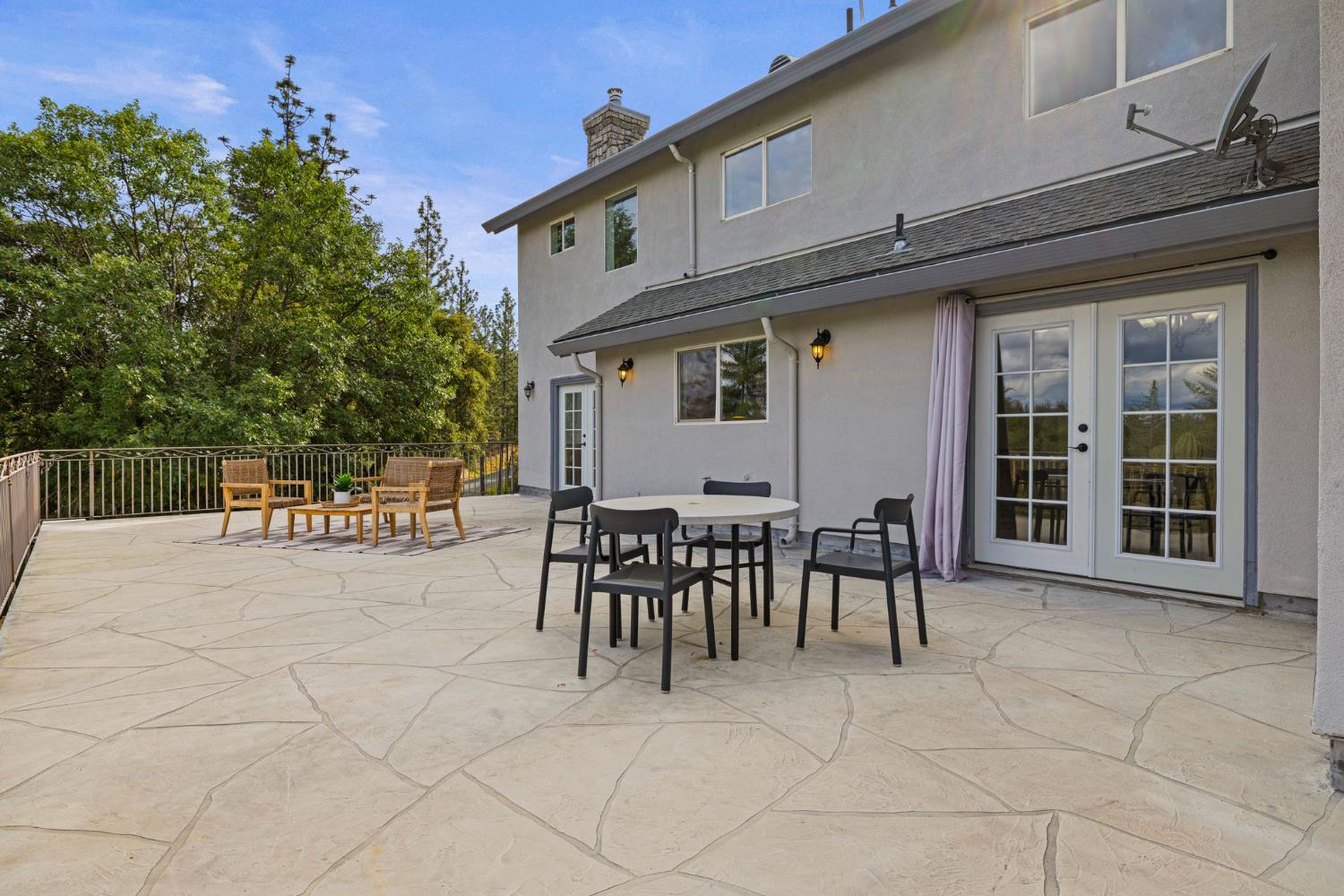 22160 Winchester Way Colfax, CA 95713 - Photo 63 of 84 a view of a chairs and table in the back yard of the house