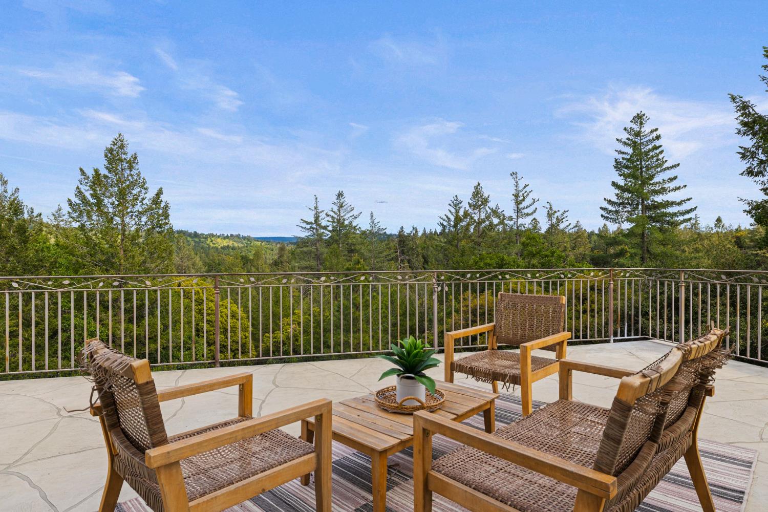 22160 Winchester Way Colfax, CA 95713 - Photo 64 of 84 a view of a chair and tables on the roof deck