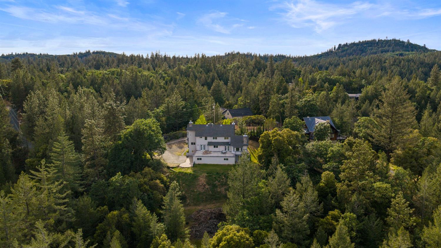 22160 Winchester Way Colfax, CA 95713 - Photo 73 of 84 a view of a city with lush green forest