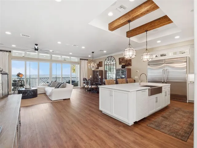 a living room with furniture fireplace and flat screen tv