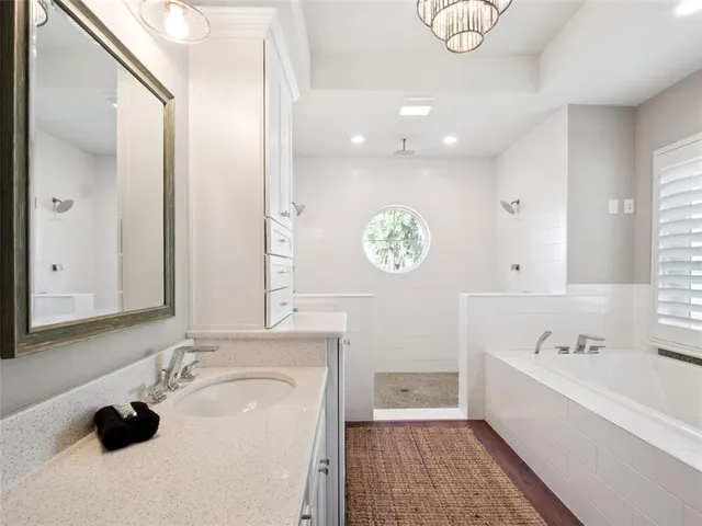 a bedroom with bed and a window