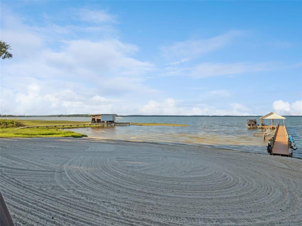 12943 Southeast Sunset Harbor Road Weirsdale, FL 32195 - Photo 50 of 65 a view of an ocean and beach