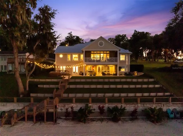 a view of kitchen with furniture and wooden floor