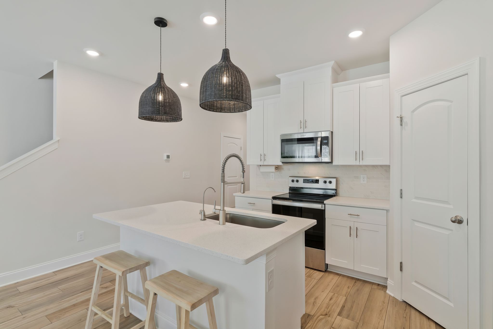 4669 Ridge Bend Drive Nashville, TN 37207 - Photo 10 of 33 a kitchen with stainless steel appliances granite countertop a sink a stove and a refrigerator