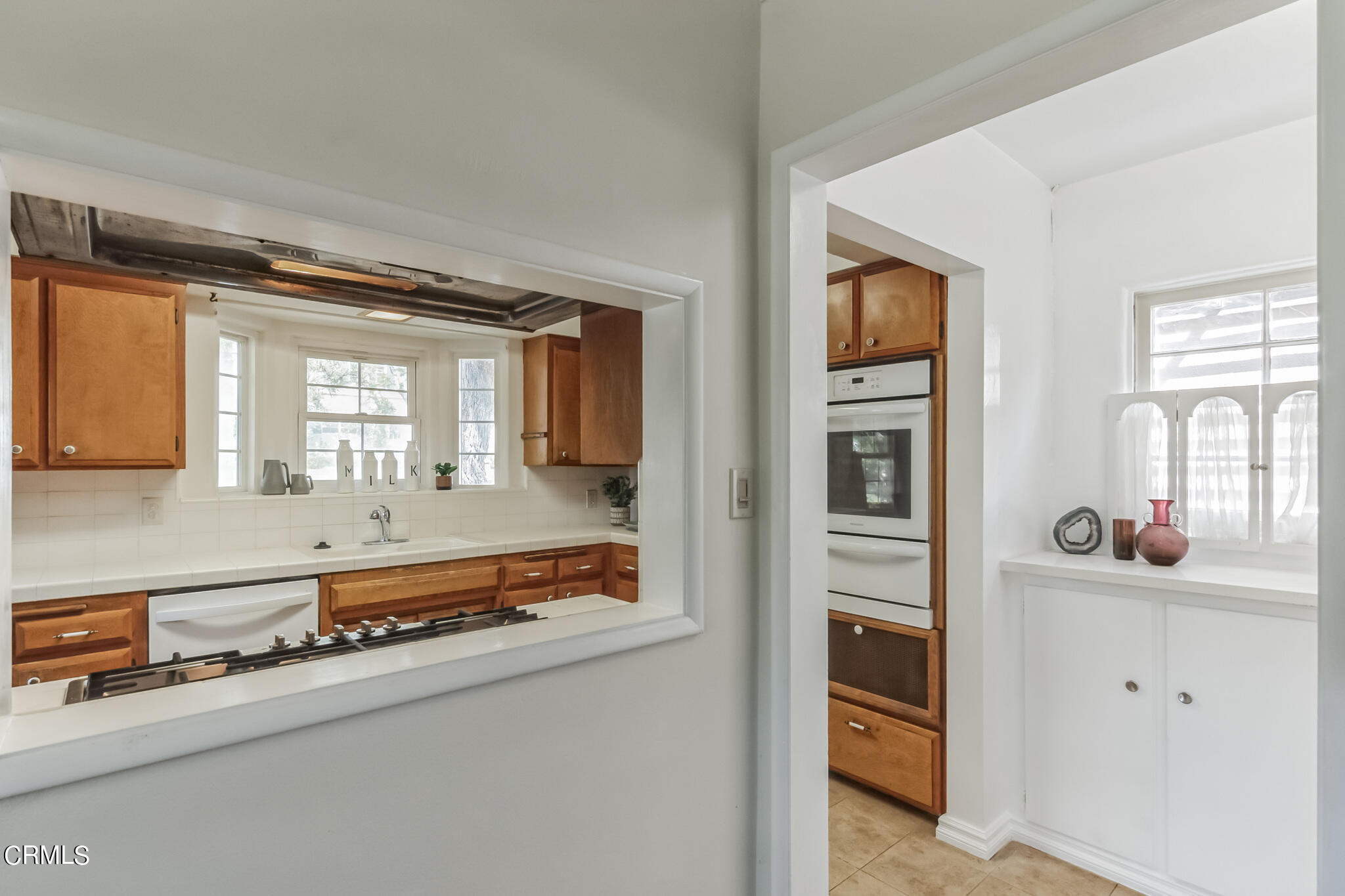 1827 West Mountain Street Glendale, CA 91201 - Photo 11 of 31 a bathroom with a sink and a mirror