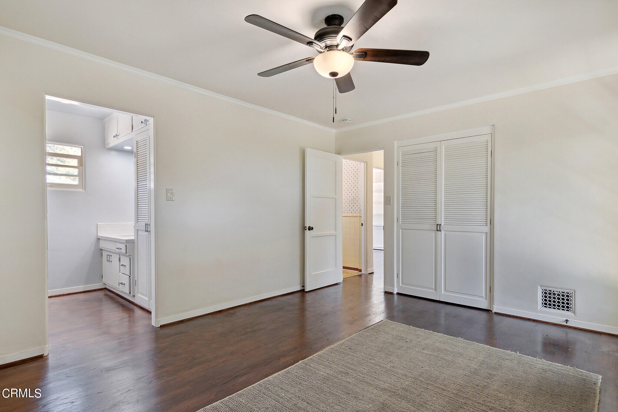 1827 West Mountain Street Glendale, CA 91201 - Photo 18 of 31 a view of a livingroom with a ceiling fan and wooden floor