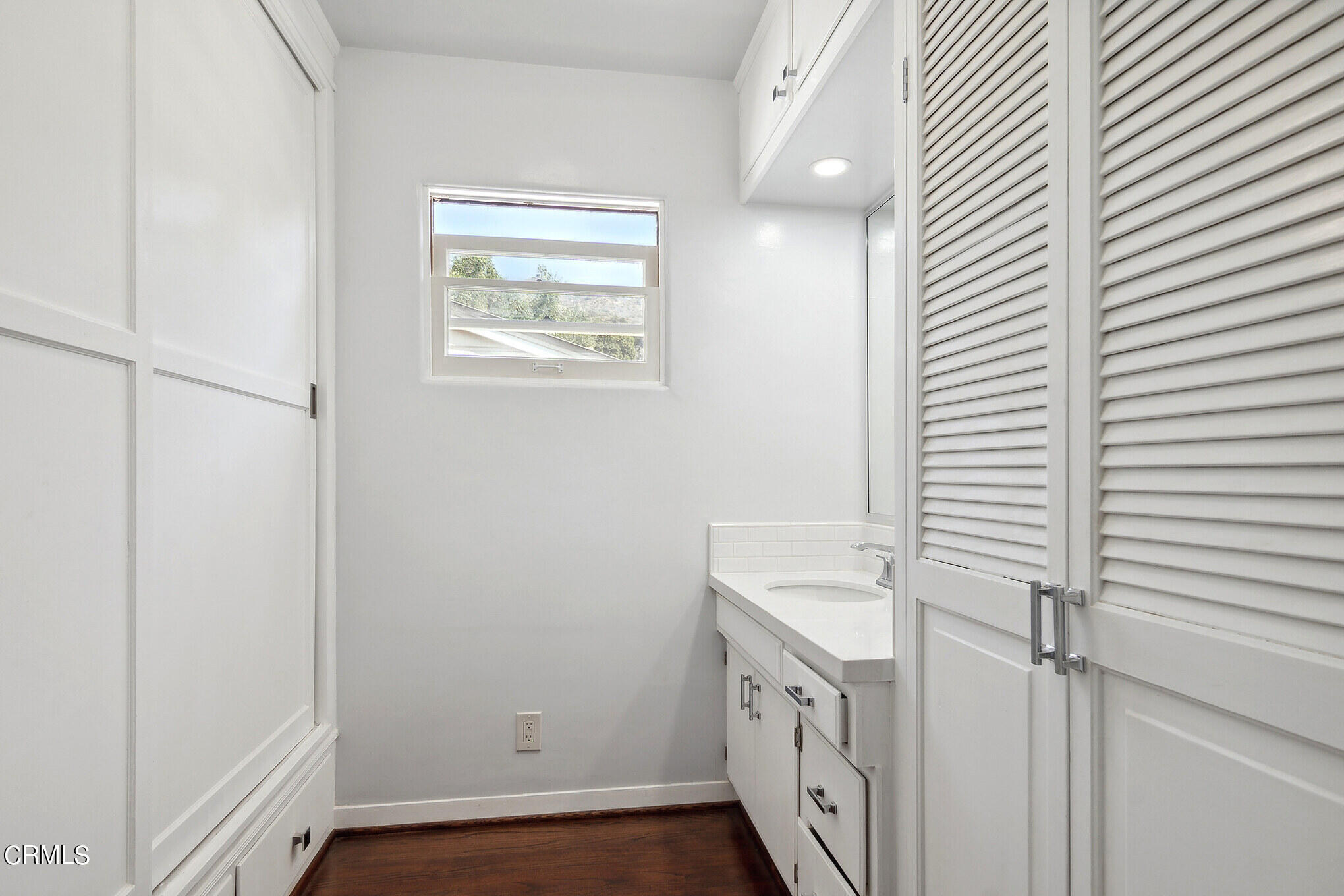 1827 West Mountain Street Glendale, CA 91201 - Photo 20 of 31 a bathroom with a sink and a mirror