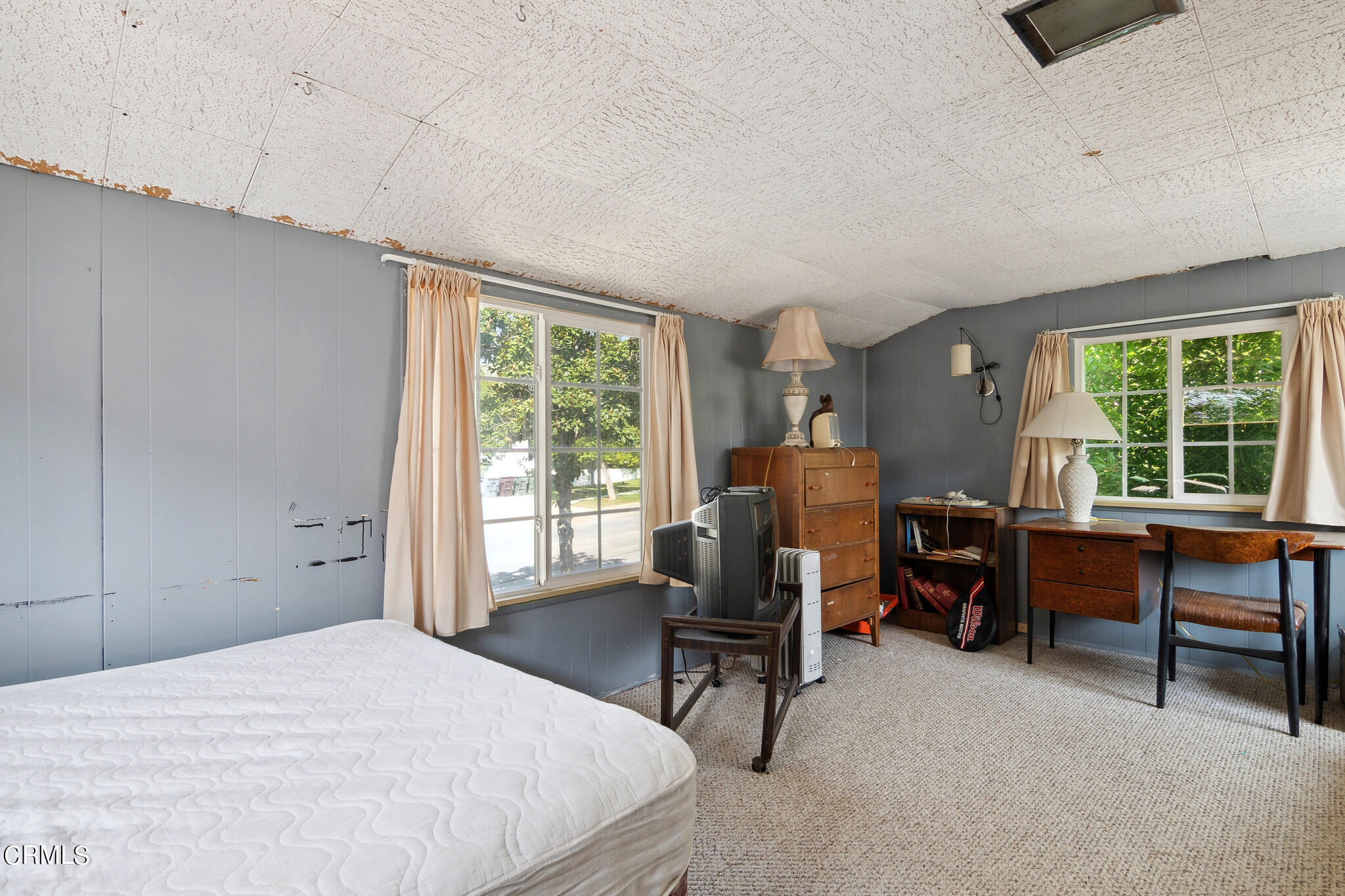1827 West Mountain Street Glendale, CA 91201 - Photo 26 of 31 a bedroom with furniture and a window