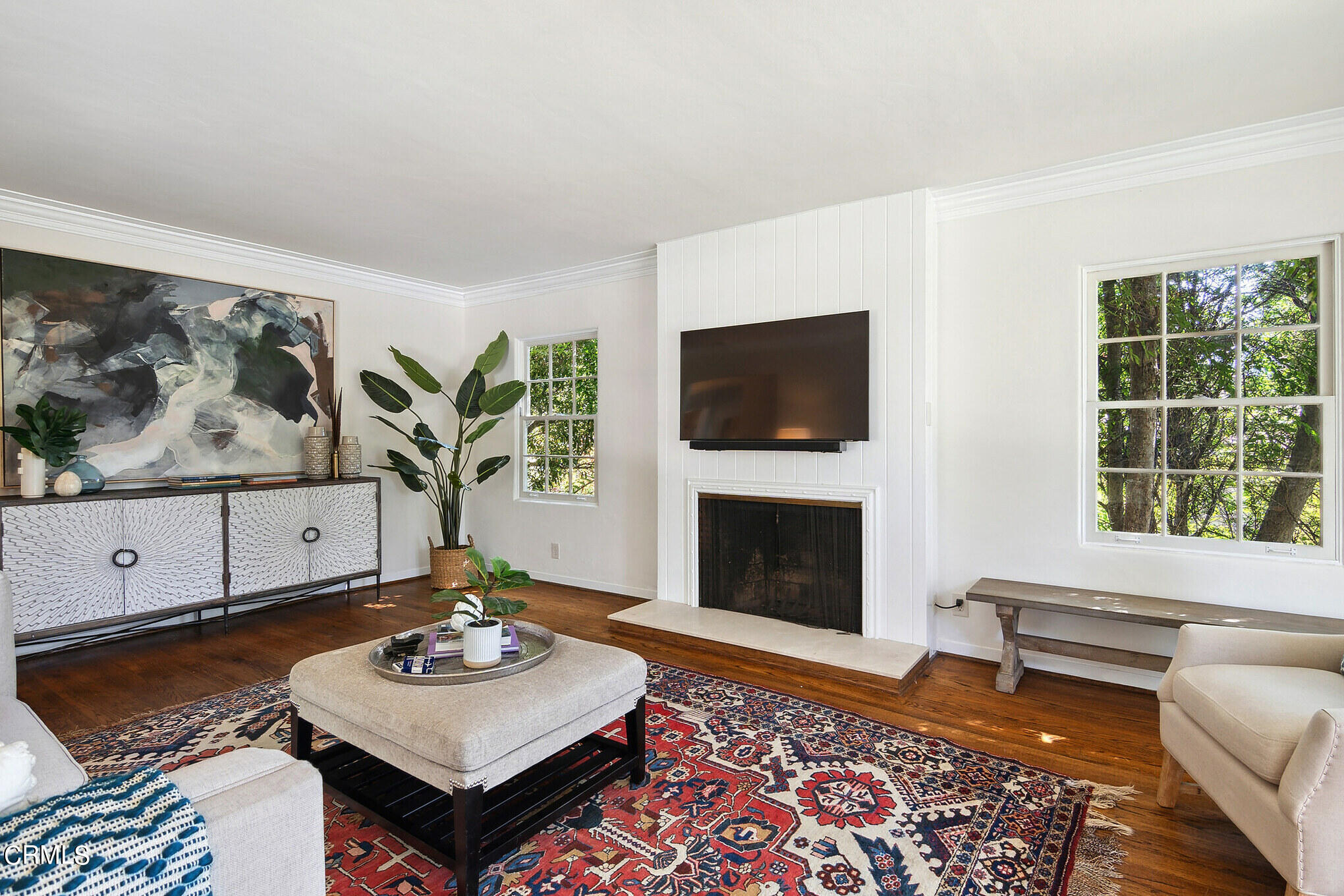 1827 West Mountain Street Glendale, CA 91201 - Photo 5 of 31 a living room with furniture a rug and a flat screen tv