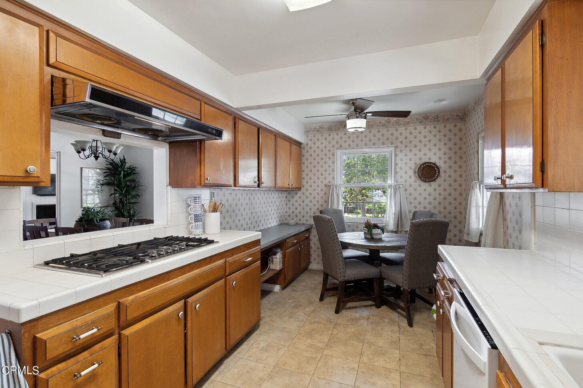 1827 West Mountain Street Glendale, CA 91201 - Photo 8 of 31 a kitchen with a stove a sink and a refrigerator