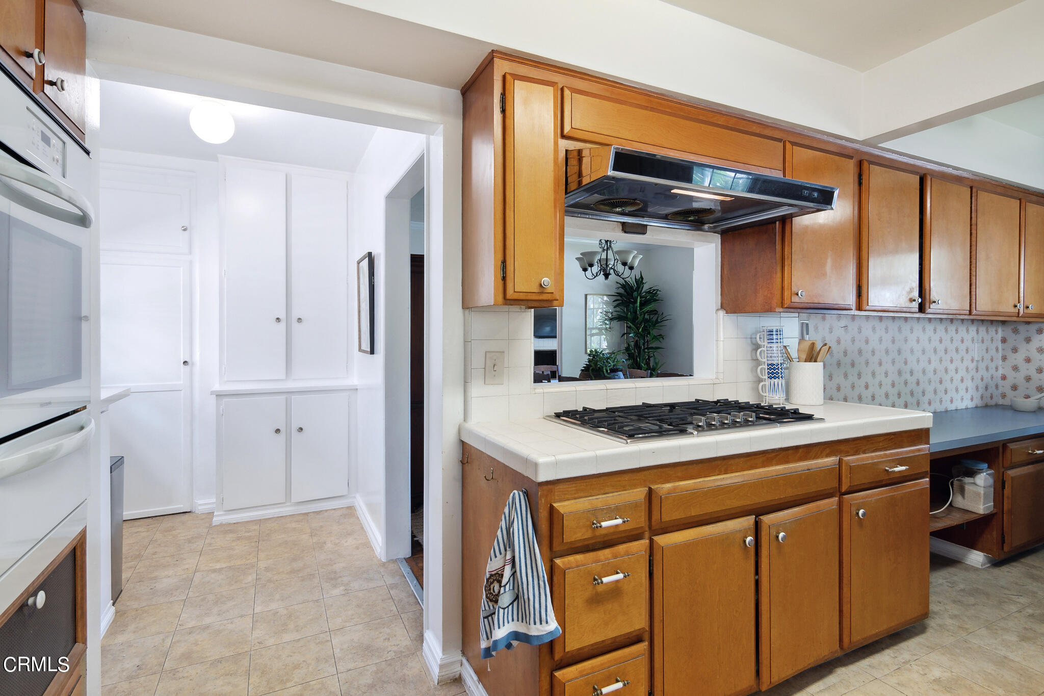 1827 West Mountain Street Glendale, CA 91201 - Photo 9 of 31 a kitchen with a stove and a refrigerator