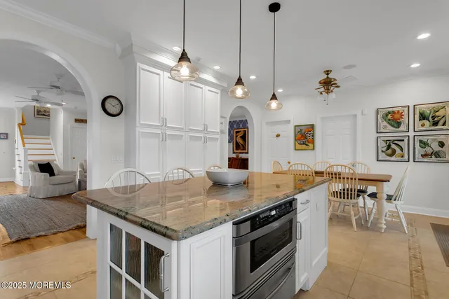 with utility room with dryer and washer