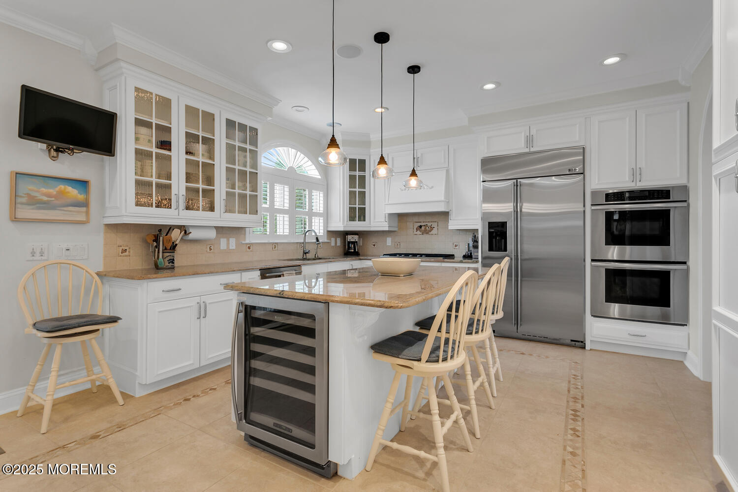 109 Salem Avenue Spring Lake, NJ 07762 - Photo 21 of 67 a kitchen with kitchen island a large counter top space appliances and cabinets