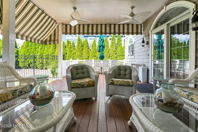 a bathroom with a sink toilet a mirror and shower