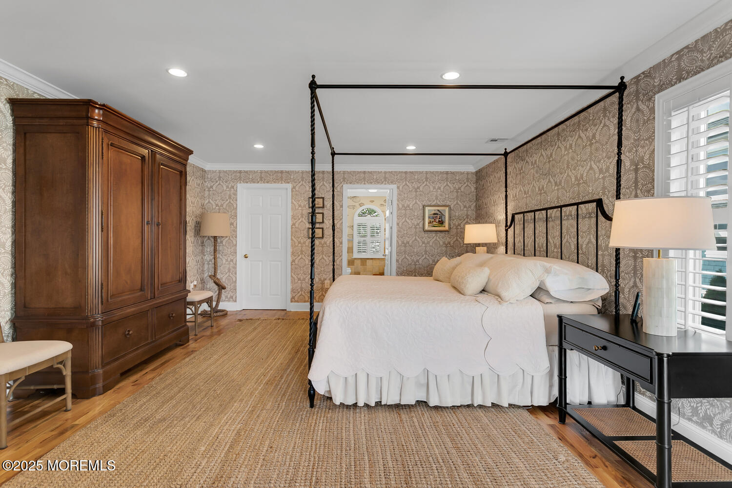 109 Salem Avenue Spring Lake, NJ 07762 - Photo 32 of 67 a bedroom with a large bed and a wooden floor