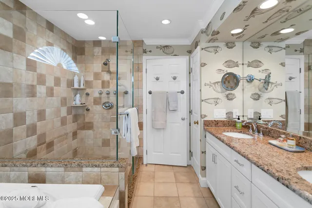 a view of a chair and table in backyard of the house