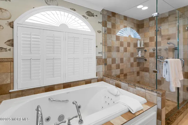 a view of a chair and tables in the roof deck