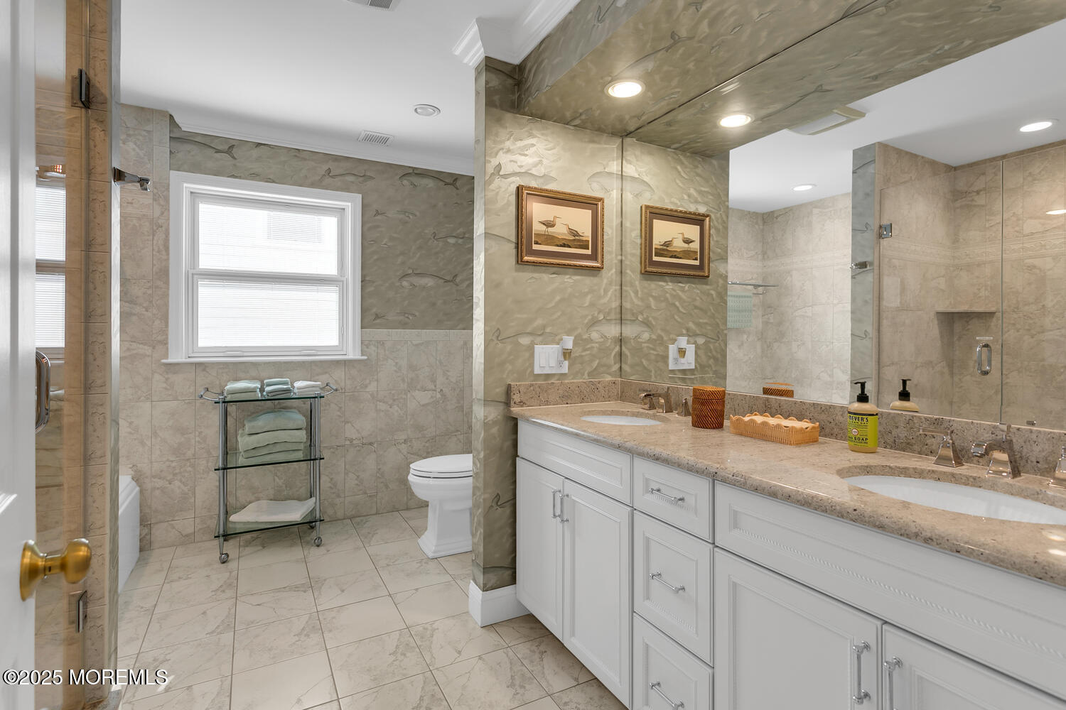 109 Salem Avenue Spring Lake, NJ 07762 - Photo 48 of 67 a spacious bathroom with a granite countertop sink a toilet and a mirror