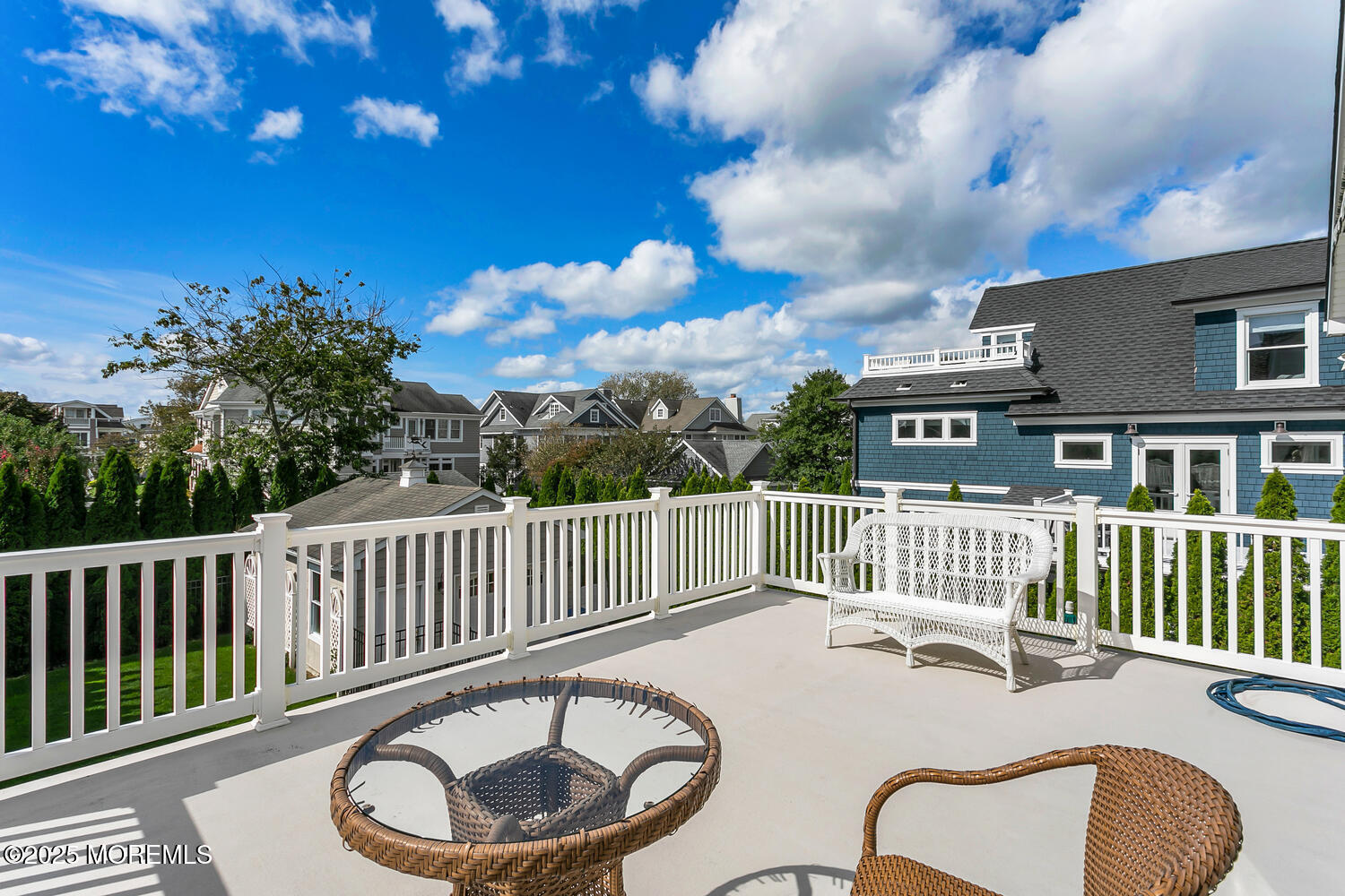 109 Salem Avenue Spring Lake, NJ 07762 - Photo 52 of 67 a view of a chair and tables in the roof deck